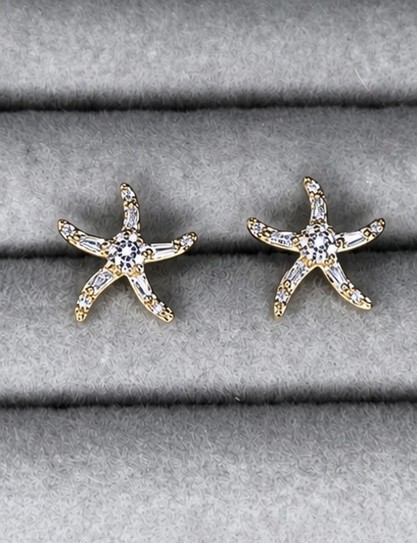 BRINCO DOURADO ESTRELA DO MAR ZIRCÔNIAS